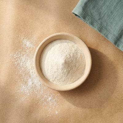 Biotin powder in a small dish